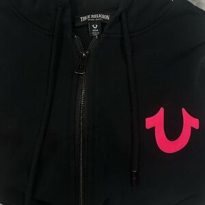 pink logo true religion